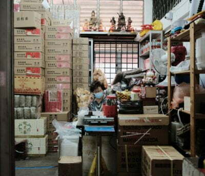 a person and a child in a warehouse