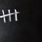 a group of people holding hands