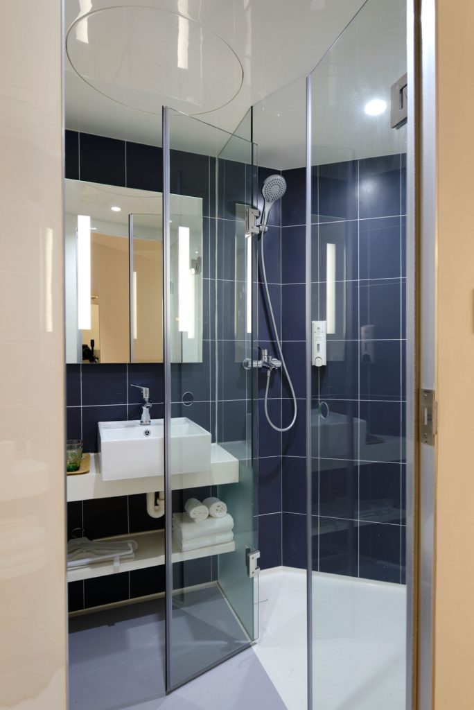 a bathroom with a glass shower