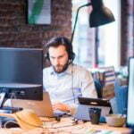 a man sitting at a desk
