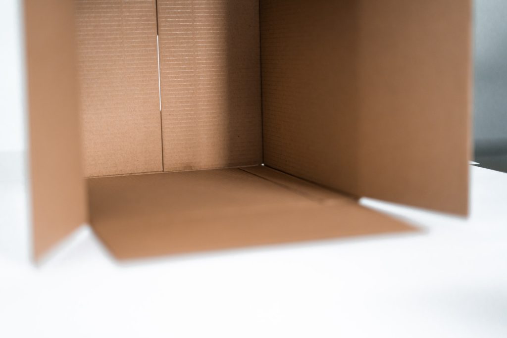 a brown box with a white surface
