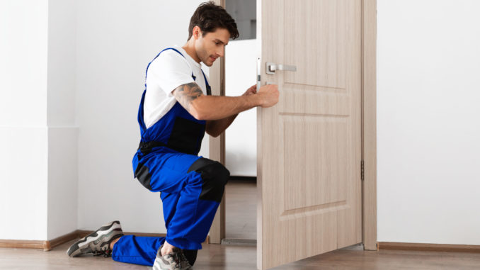 installation-of-a-lock-on-the-entrance-door-2021-11-23-21-27-30-utc-scaled