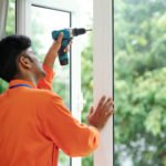 Technician Installing Window